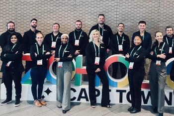 DSL Telecom employees in front of the Zoholics sign at the 2025 Zoholics Cape Town event